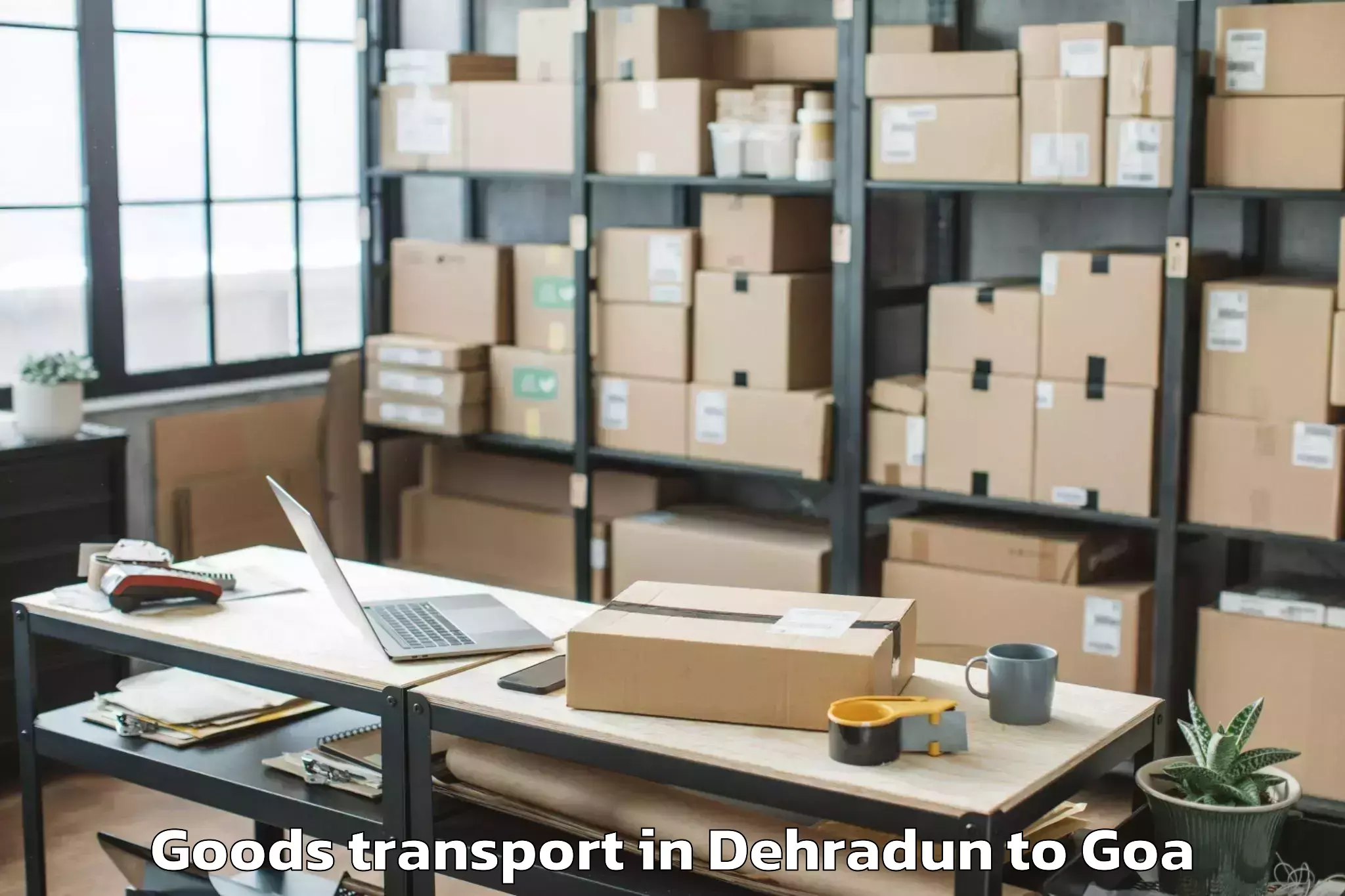 Professional Dehradun to Saligao Goods Transport